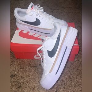 Nike Women’s White and Black Platform Sneakers
